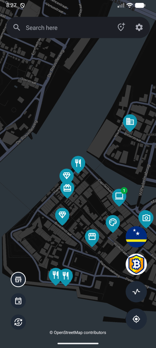 The BTC Map map with no place selected: the places, events and exchanges filter buttons sit at the bottom left, and the Curaçao country chip with a community chip sits on the right